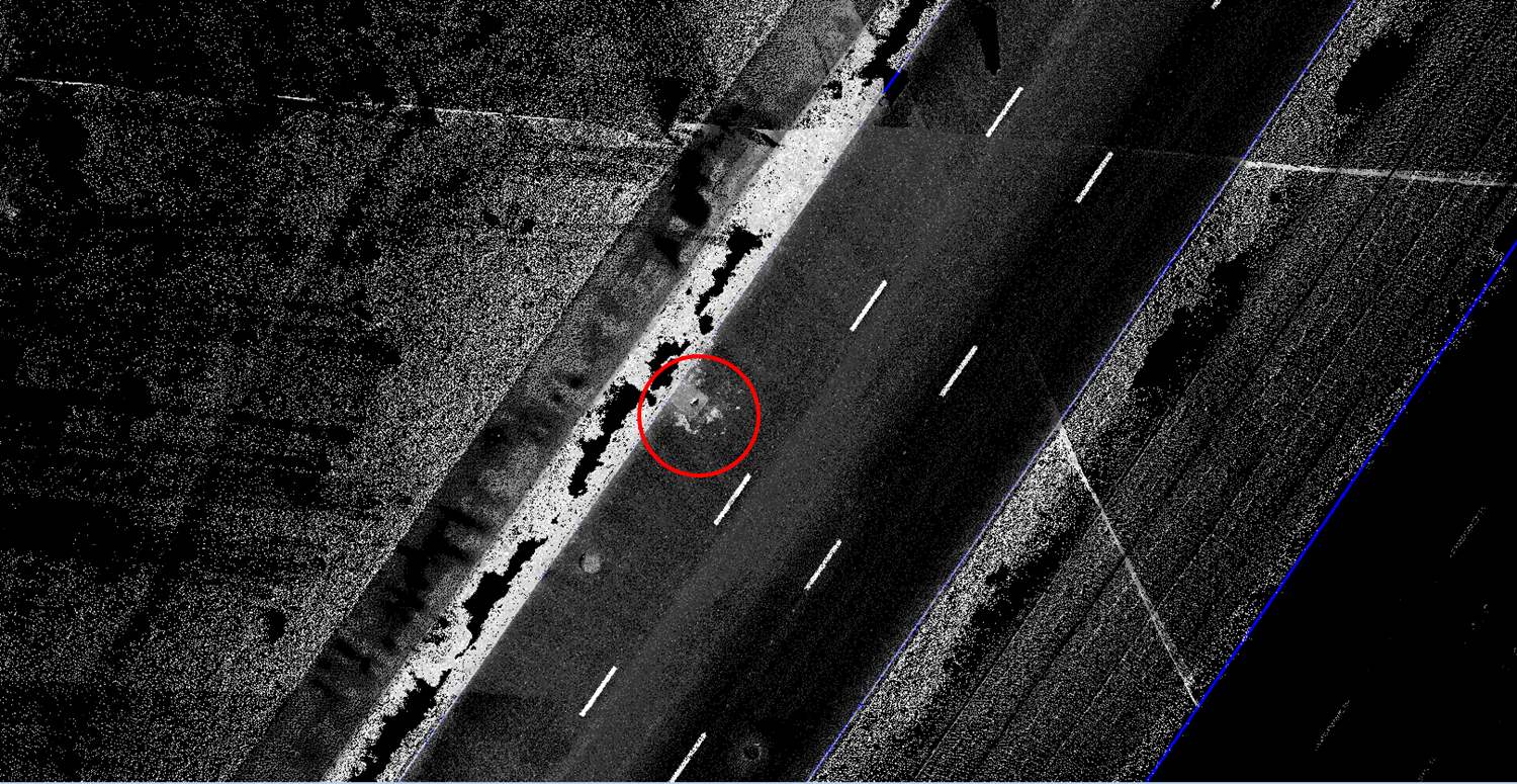 The location of the failure of the pavement in the point cloud of laser scanning